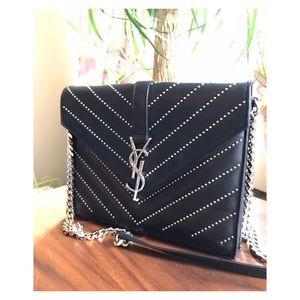 YSL Saint Laurent Chevron studded shoulder bag.
